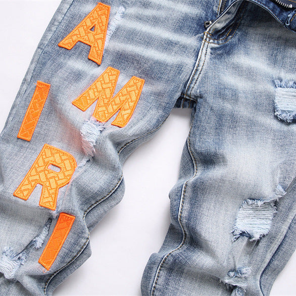 Amiri Jeans Ripped Stretch Jeans
