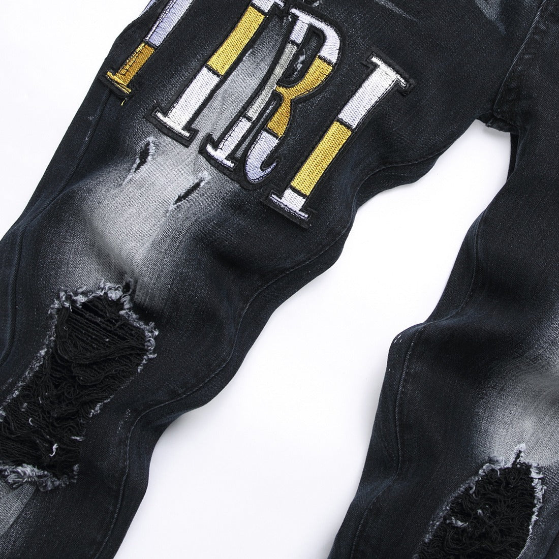 Amiri Jeans Ripped Stretch Jeans