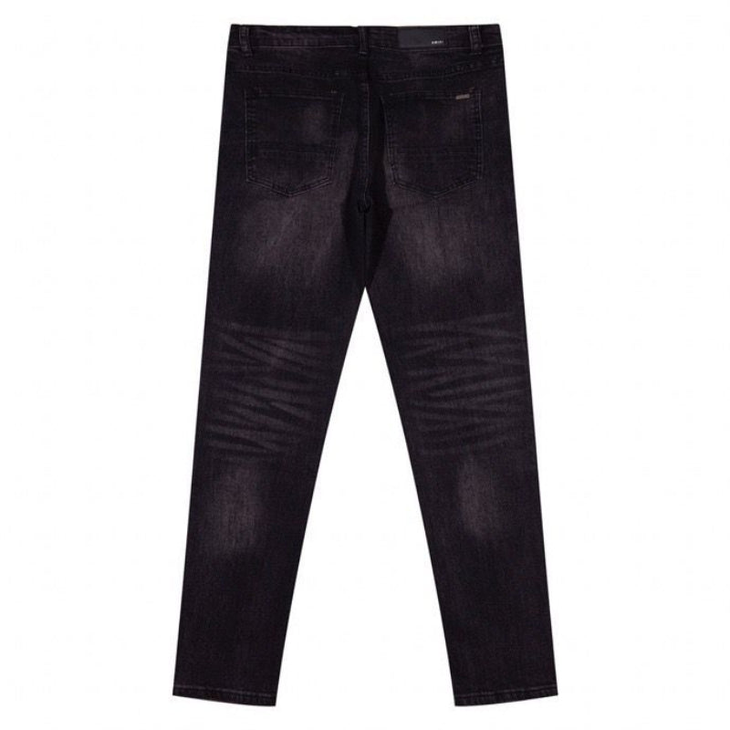 Amiri Jeans splashes ink and washes old ripped slim jeans